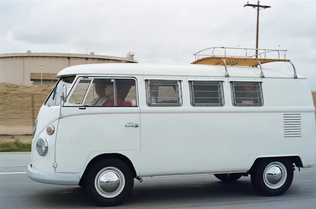 Vintage white VW camper van decorated for a wedding